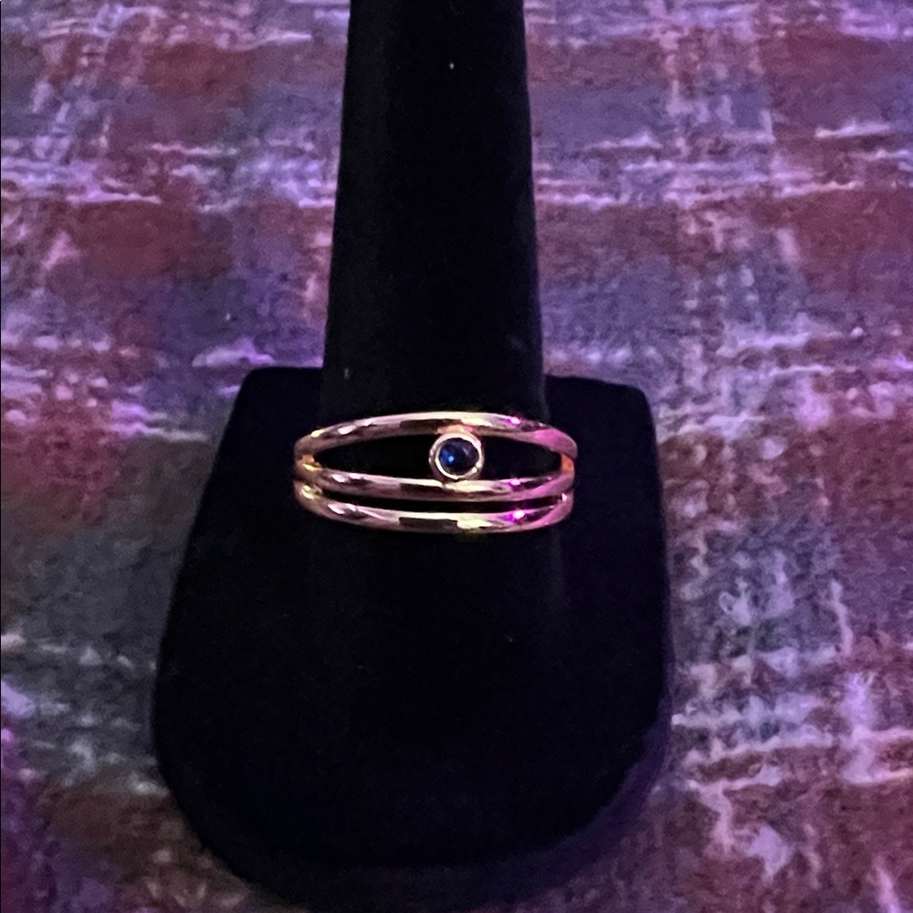 Elegant Gold Ring with Blue Gemstone